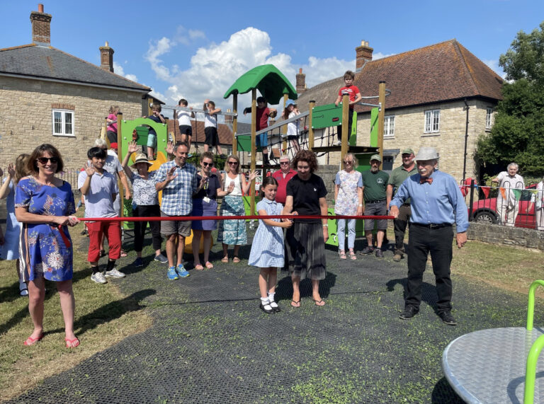 Slide into Walnut Road playground; it’s open again!